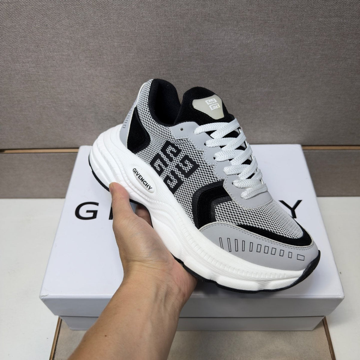Givenchy Paneled Low-Top Sneakers — model