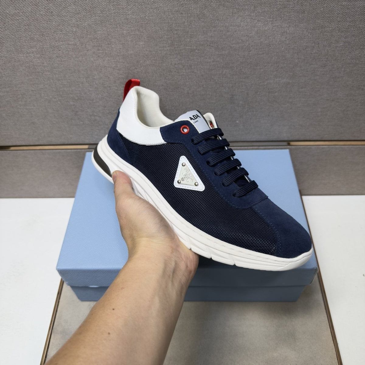 Prada Paneled Low-Top Sneakers — model