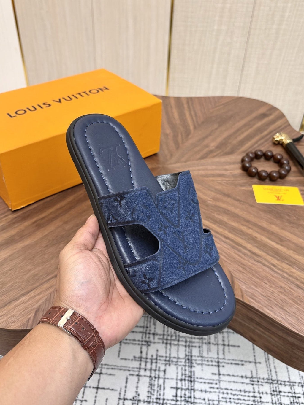 Louis Vuitton Embossed Navy Blue Slide Sandals — model