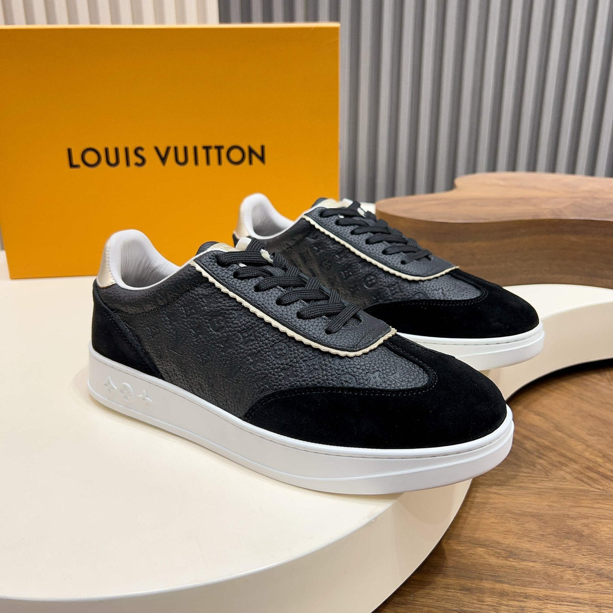 Louis Vuitton Embossed Low-Top Sneakers — front