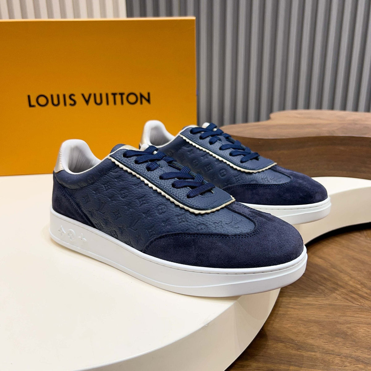 Louis Vuitton Embossed Low-Top Sneakers — side