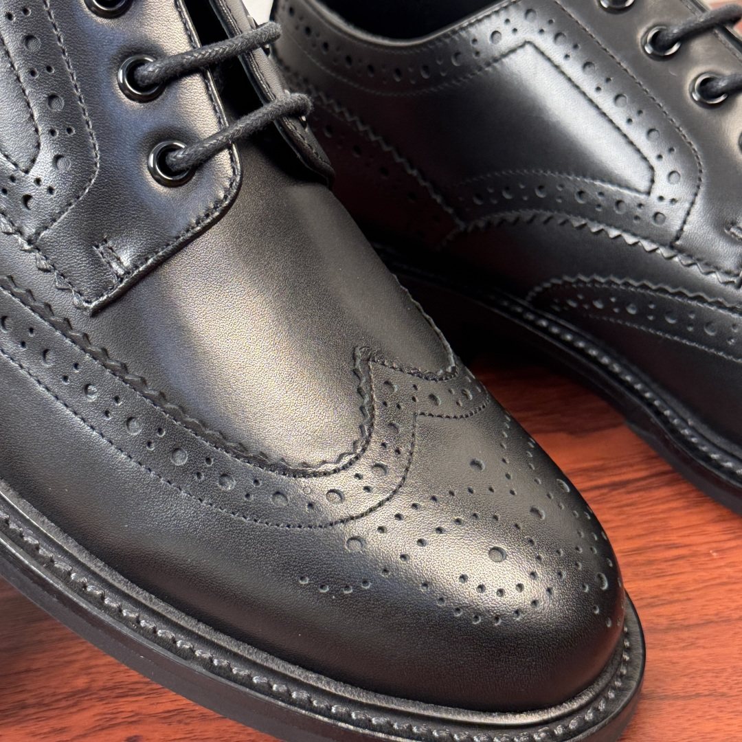 Prada Burnished Brogue Derby Shoes — detail