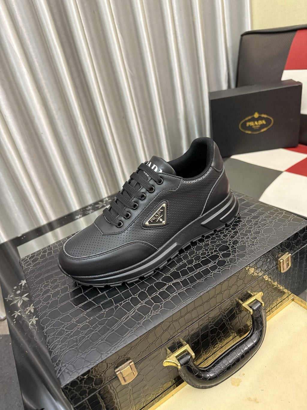 Prada Triangle Plaque Lace-Up Sneakers — hero