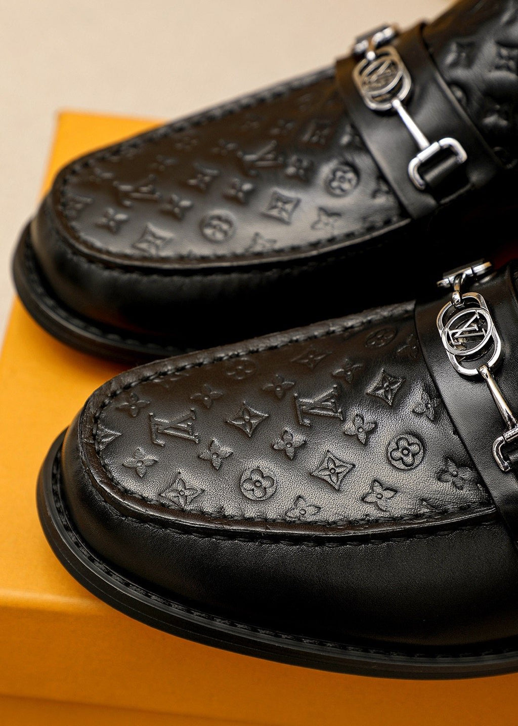 Louis Vuitton Embossed Buckle Loafers — detail
