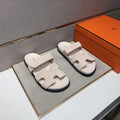 Hermès Cutout Slide Sandals — hero