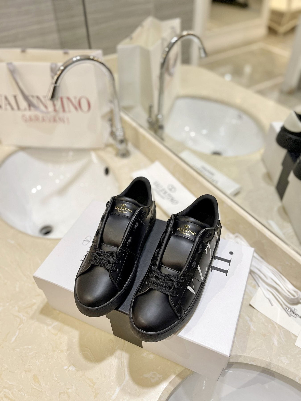 Valentino VLTN Stud Low-Top Sneakers — side