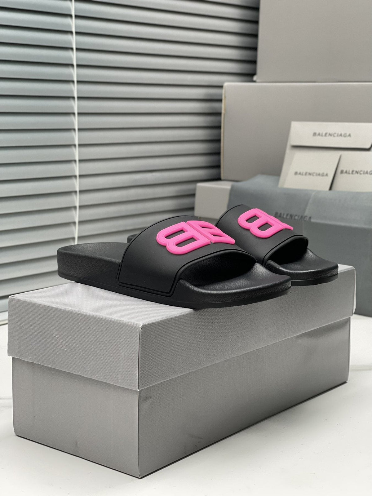 Balenciaga Raised Motif Slide Sandals — side