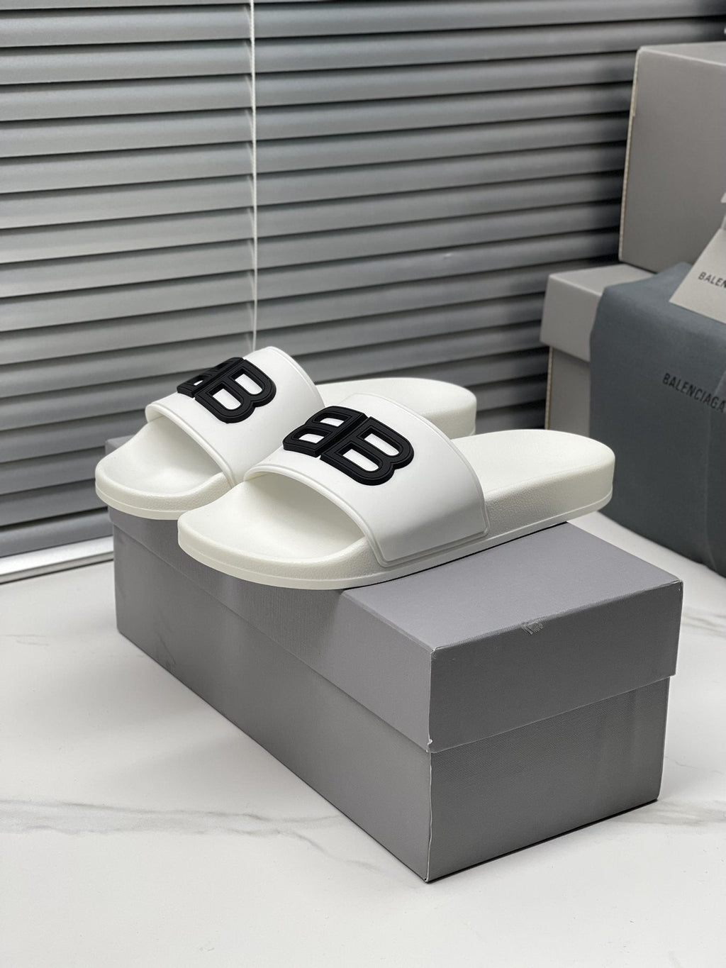Balenciaga Raised Motif Slide Sandals — front