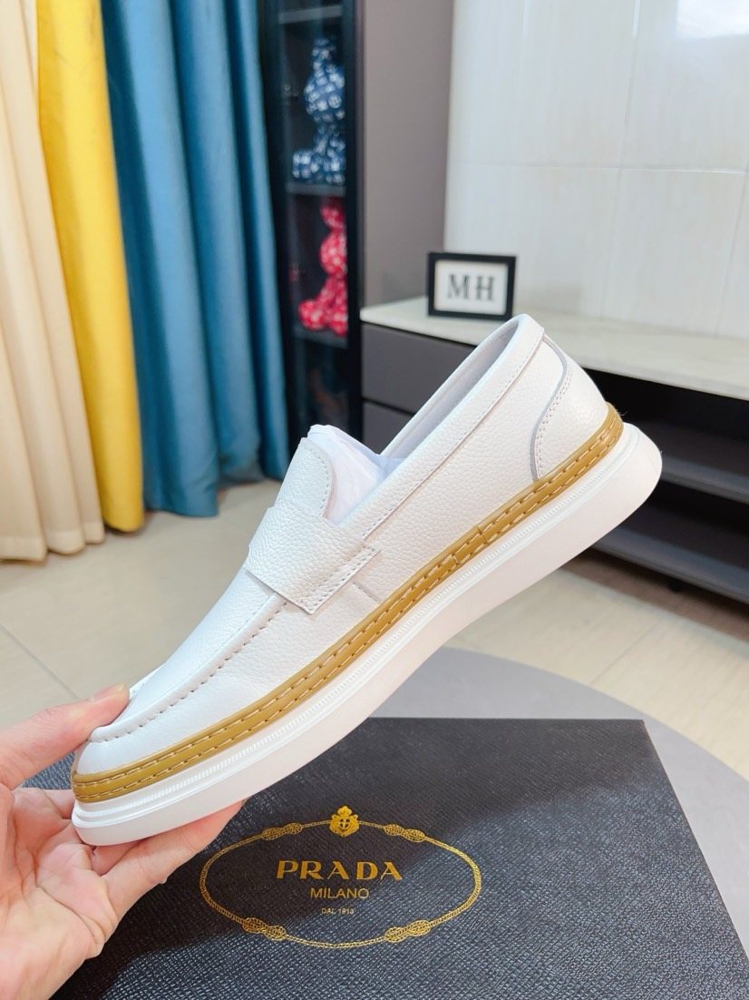 Prada Textured Slip-On Shoes — side