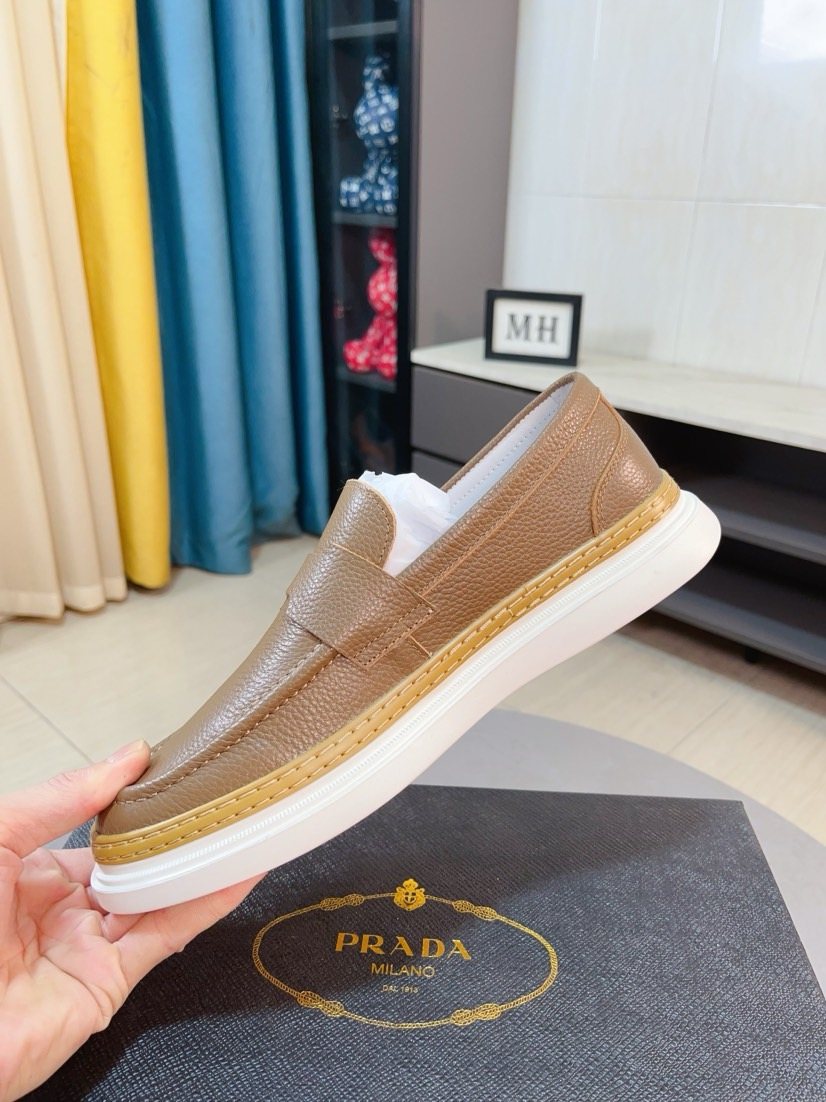 Prada Textured Slip-On Shoes — side