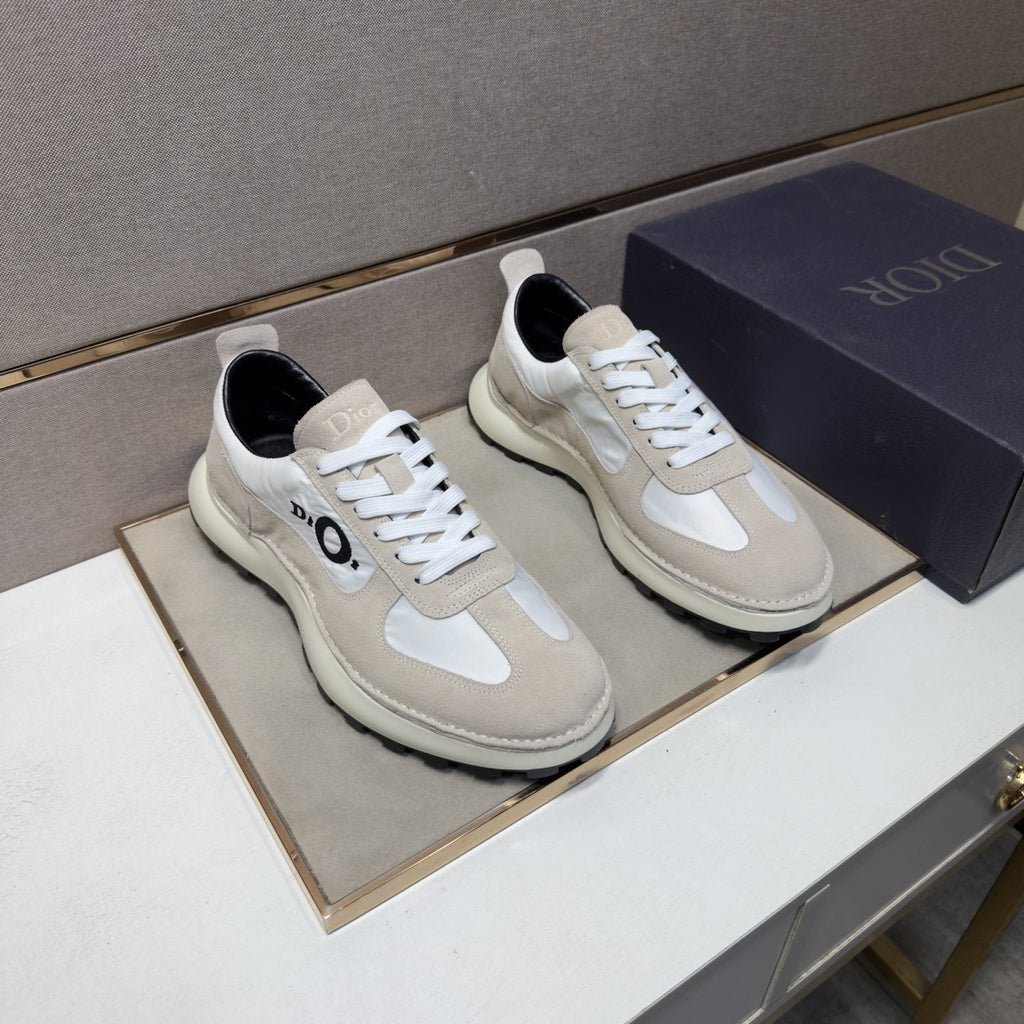 Dior Men's Paneled Low-Top Sneakers — hero