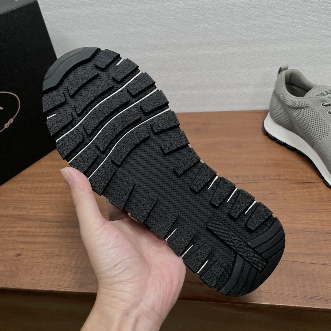 Prada Knit Lace-Up Sneakers — detail