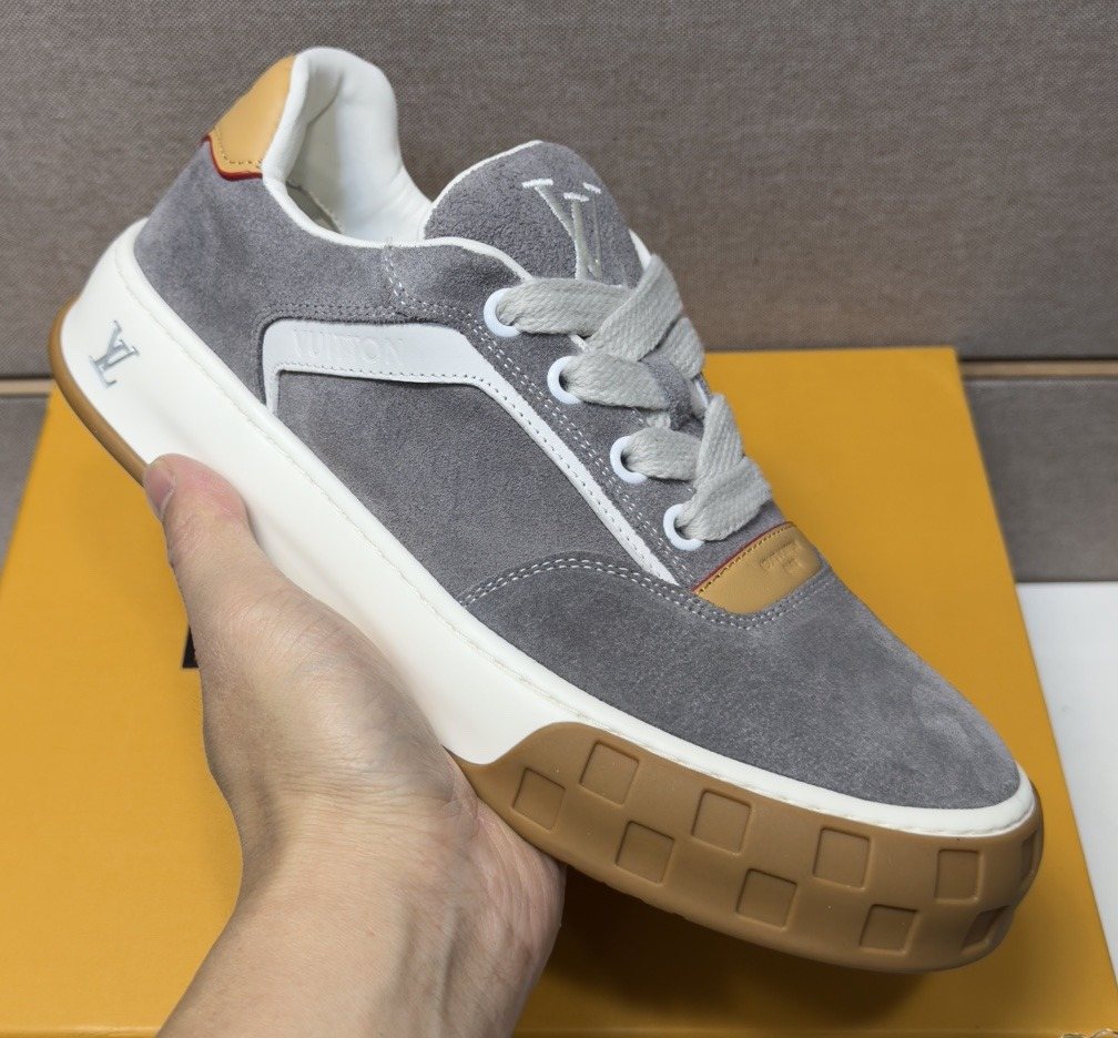 Louis Vuitton Paneled Low-Top Sneakers — front