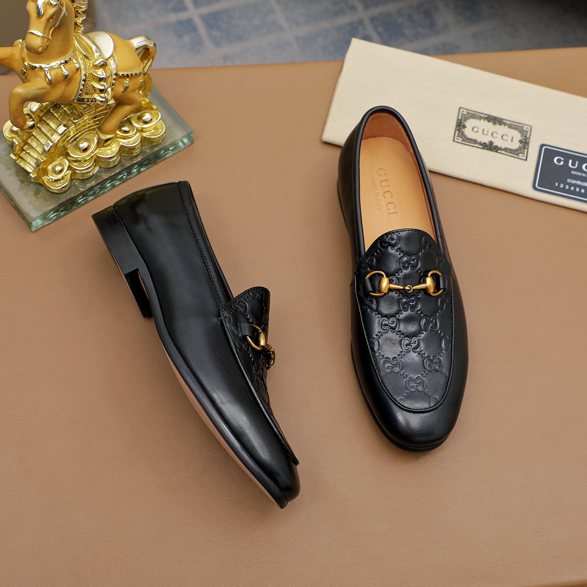 Gucci Black Embossed Loafers — front