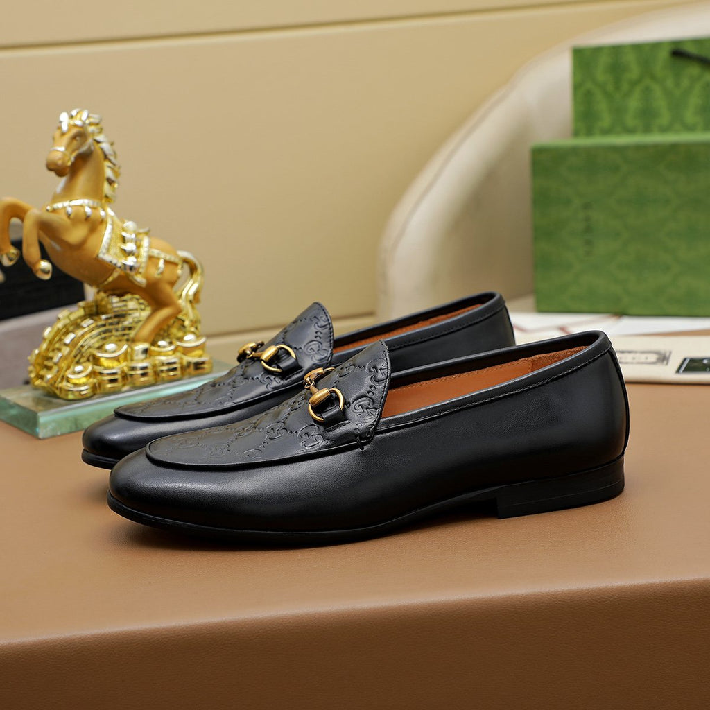 Gucci Black Embossed Loafers — front