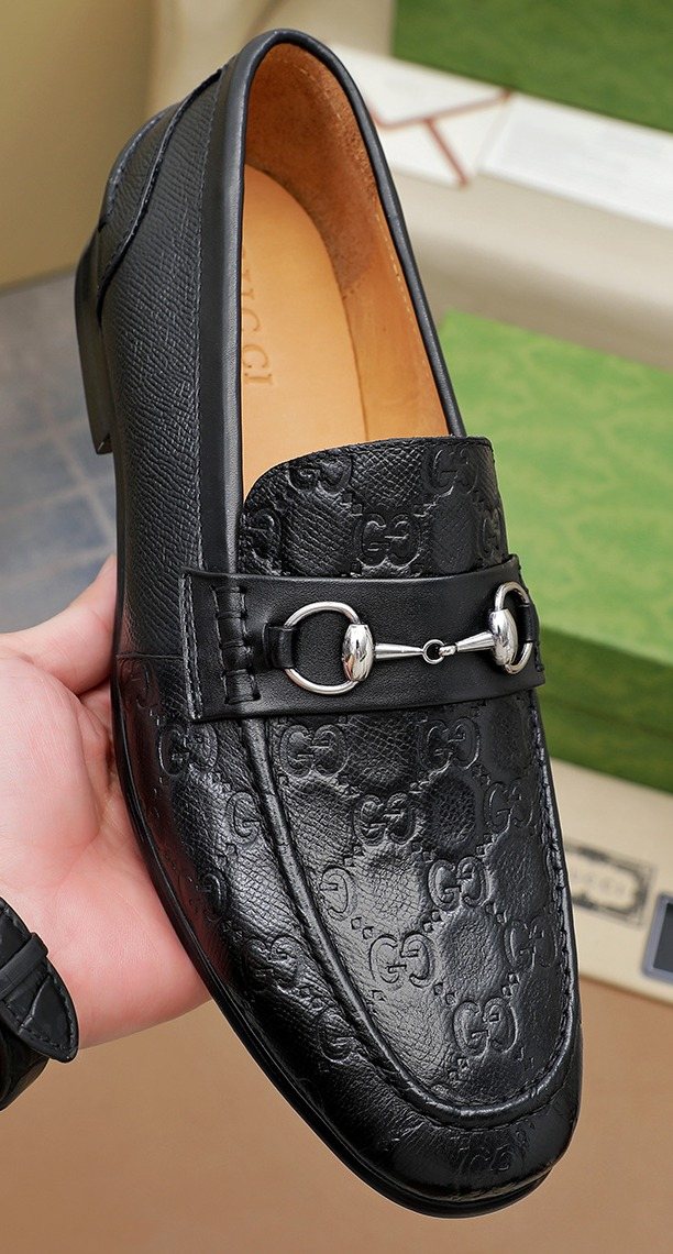 Gucci Black Embossed Loafers — front