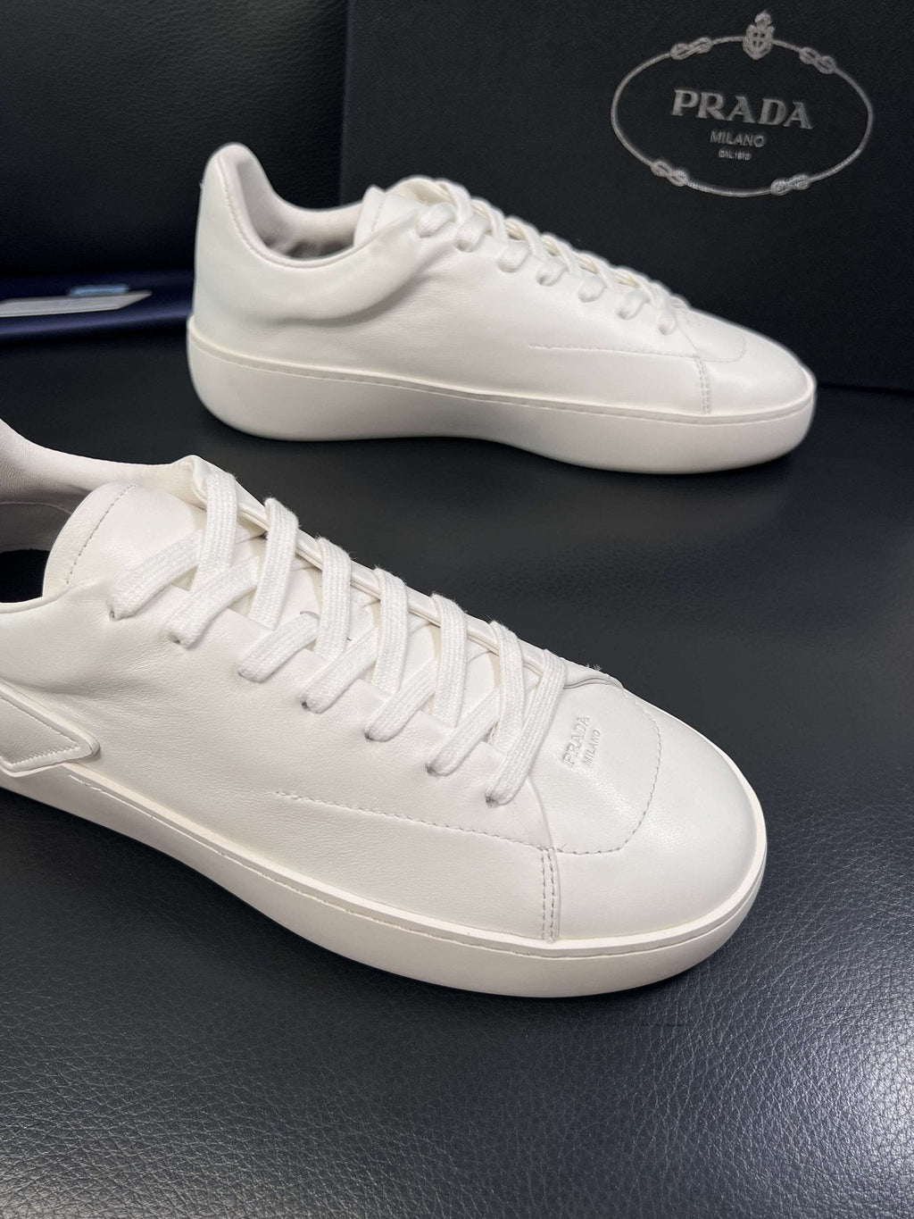 Prada Low-Top Leather Sneakers — detail