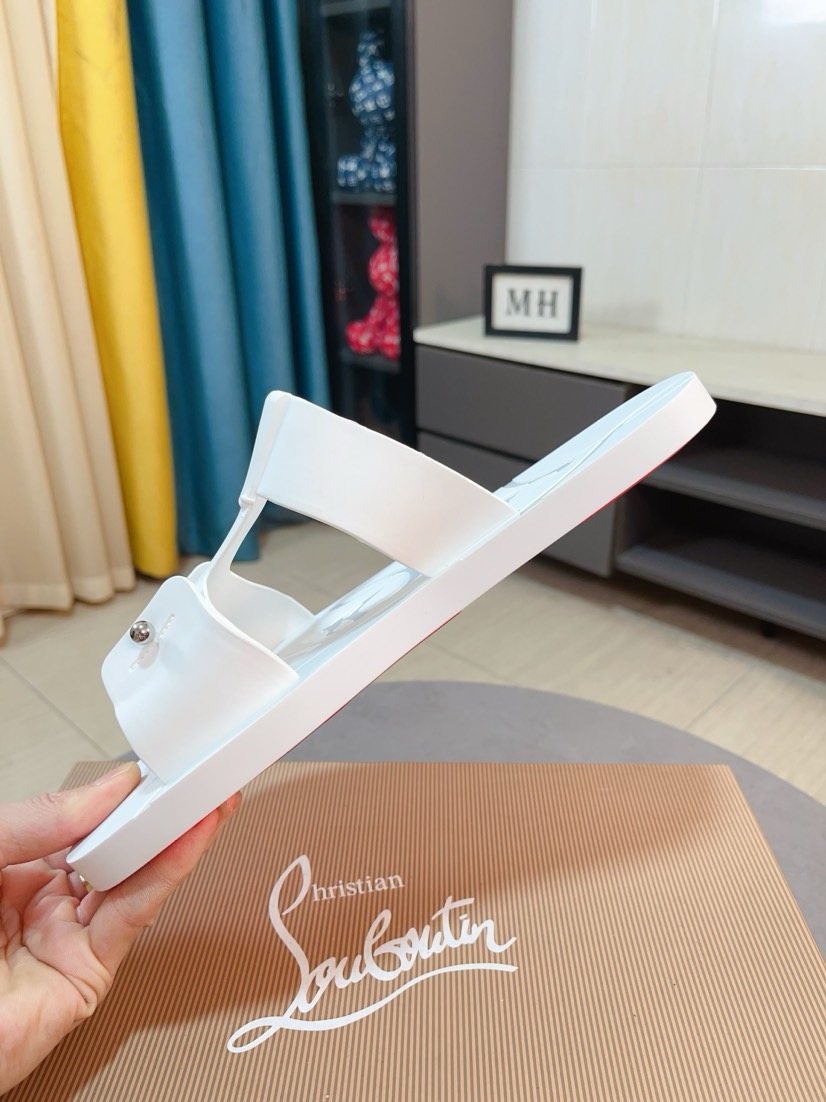 Christian Louboutin Studded Slip-On Sandals — side