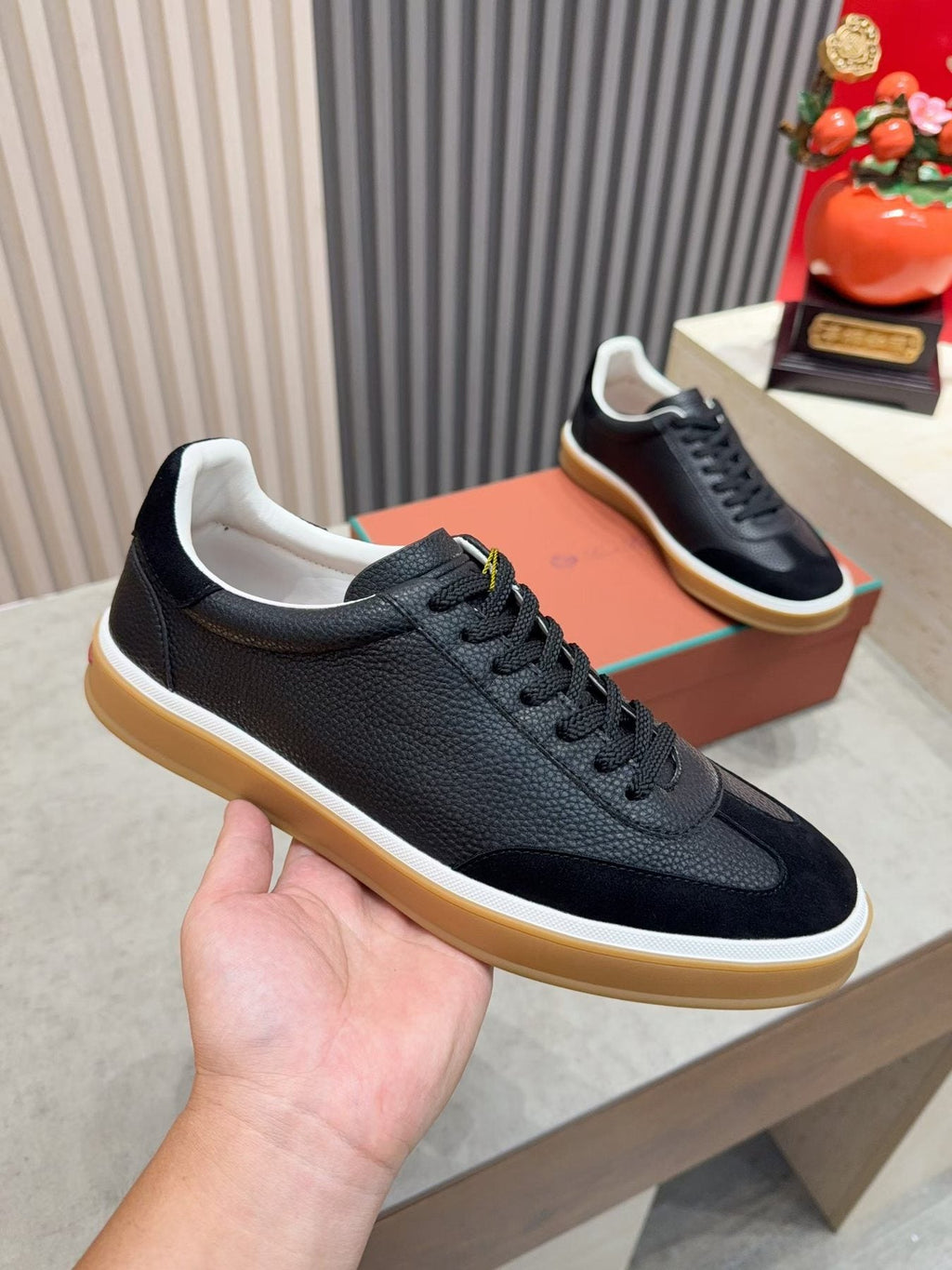 Paneled Low-Top Lace-Up Sneakers — model