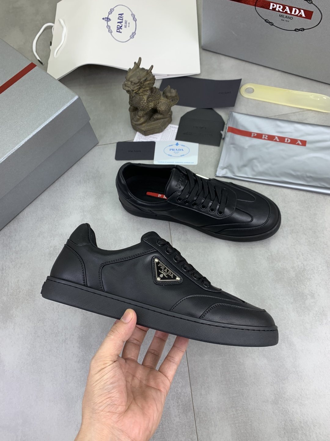 Prada Paneled Low-Top Sneakers — model
