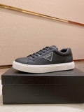 Prada Plaque Low-Top Sneakers — hero