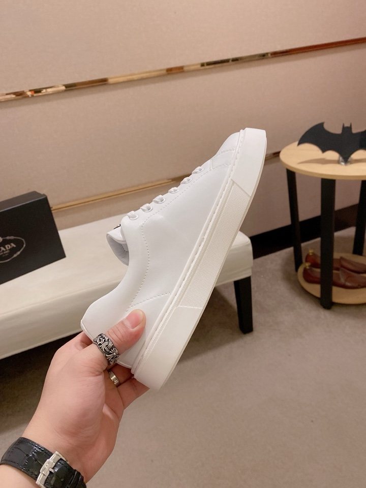 Prada Plaque Low-Top Sneakers — model