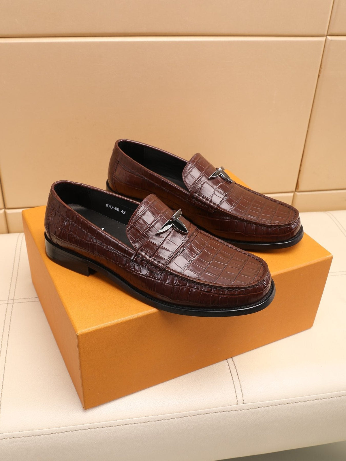 Louis Vuitton Embossed Strap Loafers — front