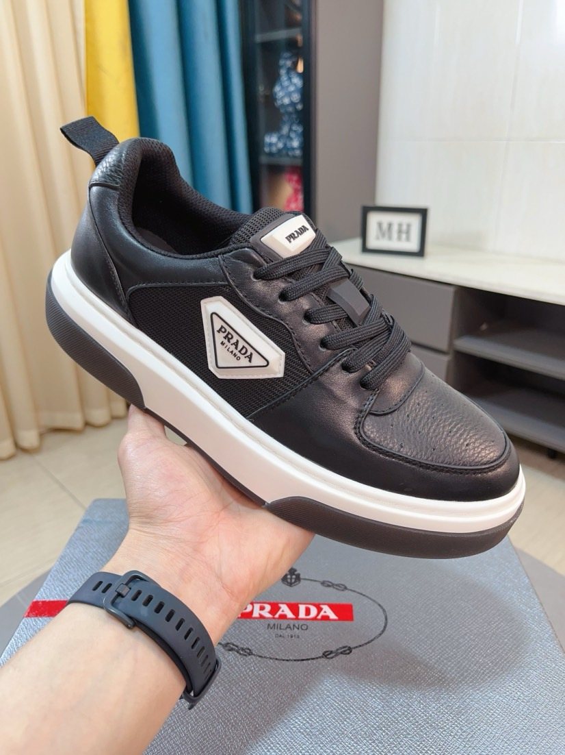 Prada Triangular Logo Sneakers — model