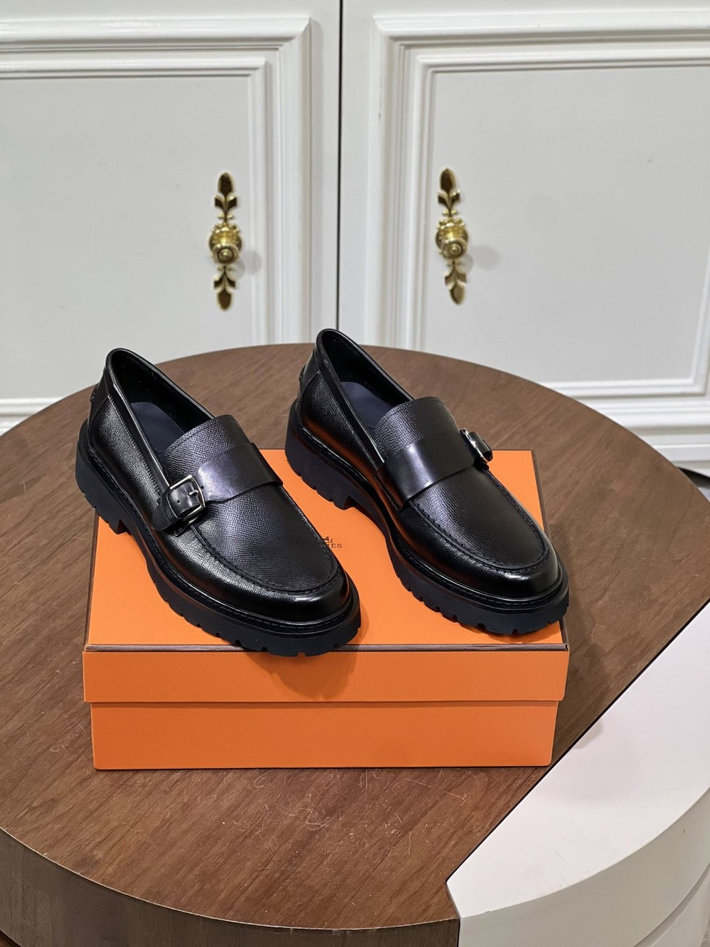 Hermès Men's Metal-Bar Lug Sole Loafers — front