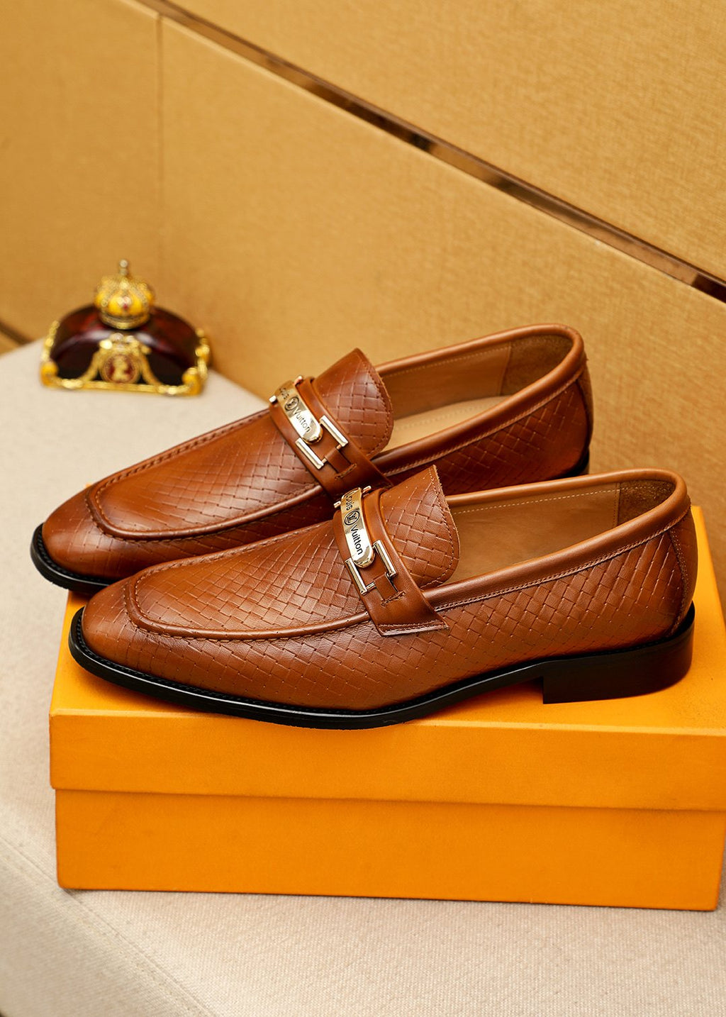 Louis Vuitton Brown Embossed Buckle Loafers — front