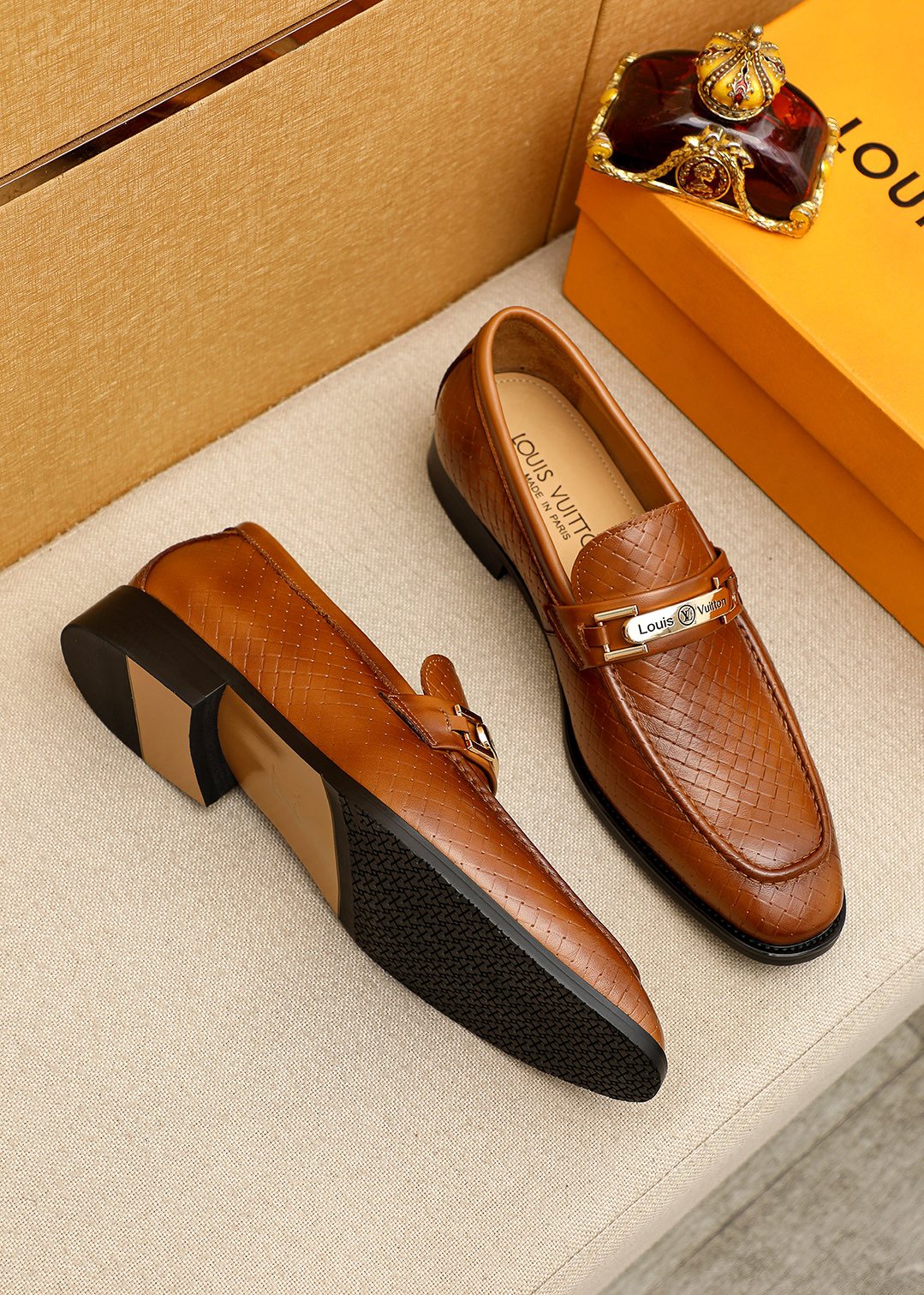 Louis Vuitton Brown Embossed Buckle Loafers — front