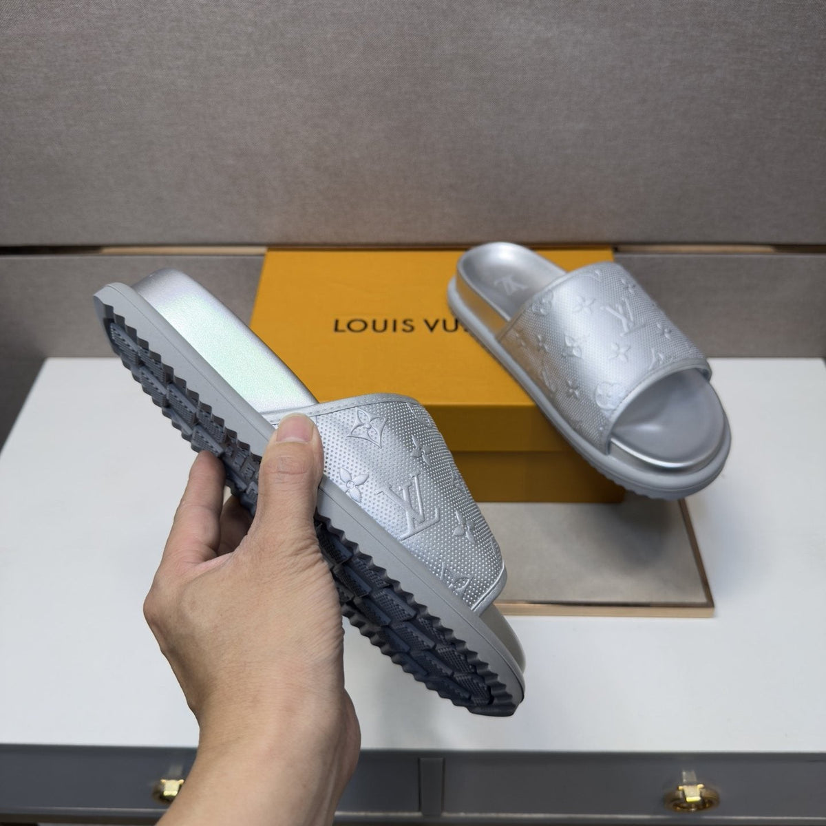 Louis Vuitton Embossed Metallic Slide Sandals — detail